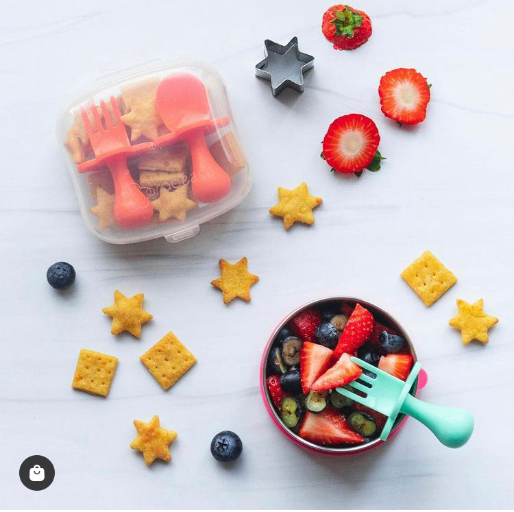 Flatlay of snacks and Grabease Baby and Toddler Cutlery