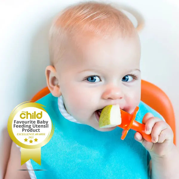 Baby eating with a grabease infant self-feeding fork