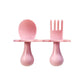Blush Pink Infant Self-Feeding Fork and Spoon Set with a short handle and choke-guard